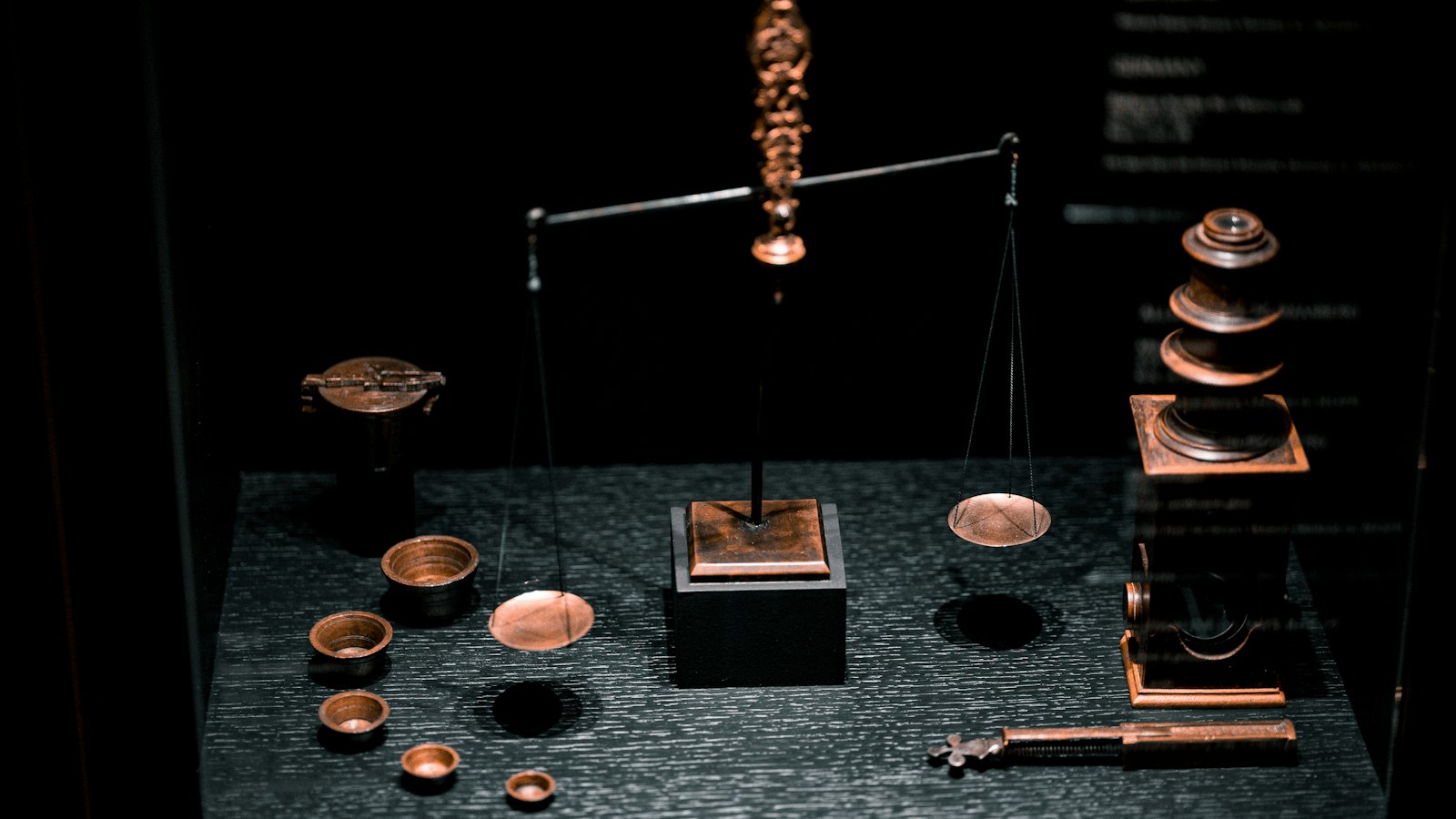 A display case containing a weighing scale