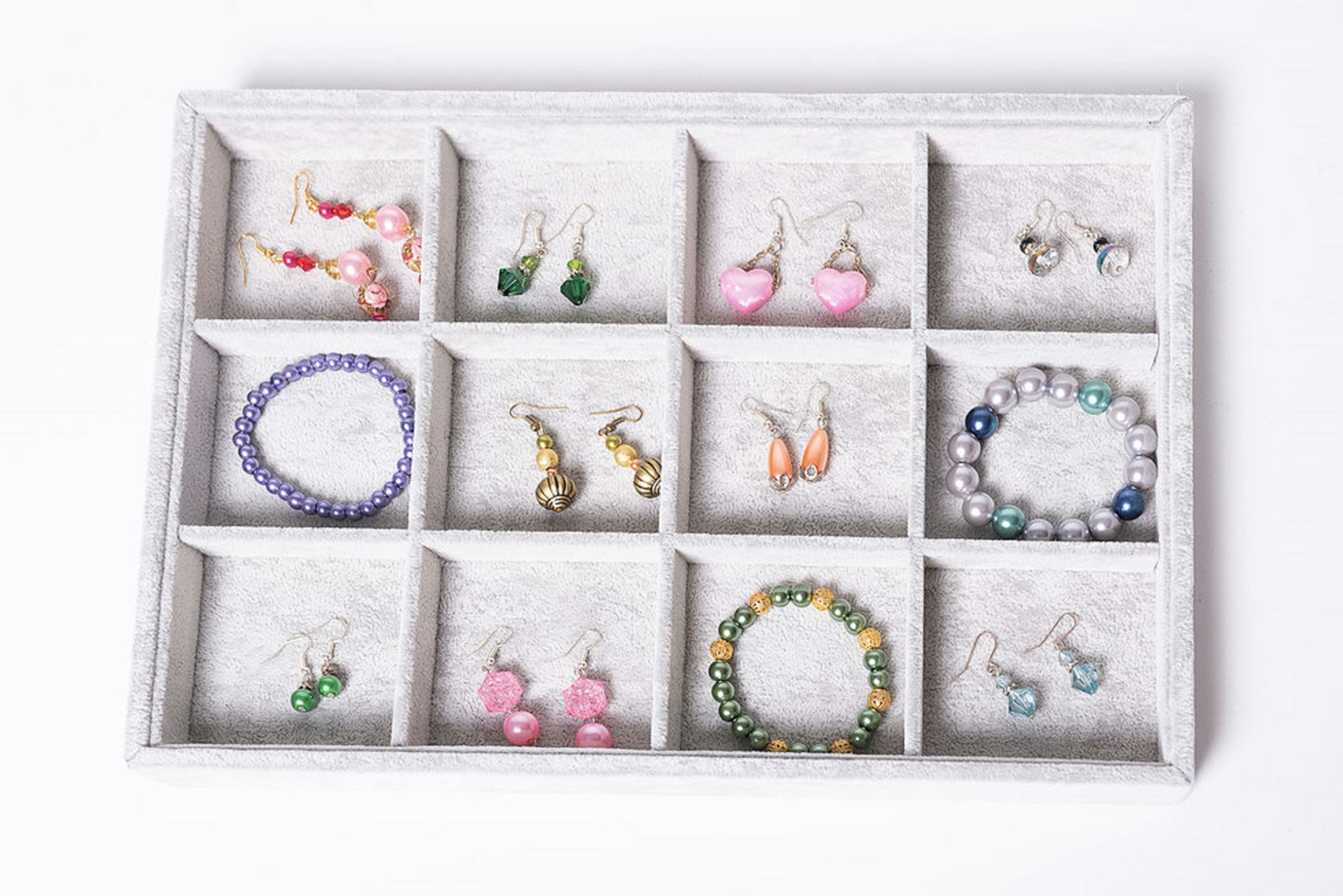 A collection of jewellery in a box A collection of jewellery in a box
